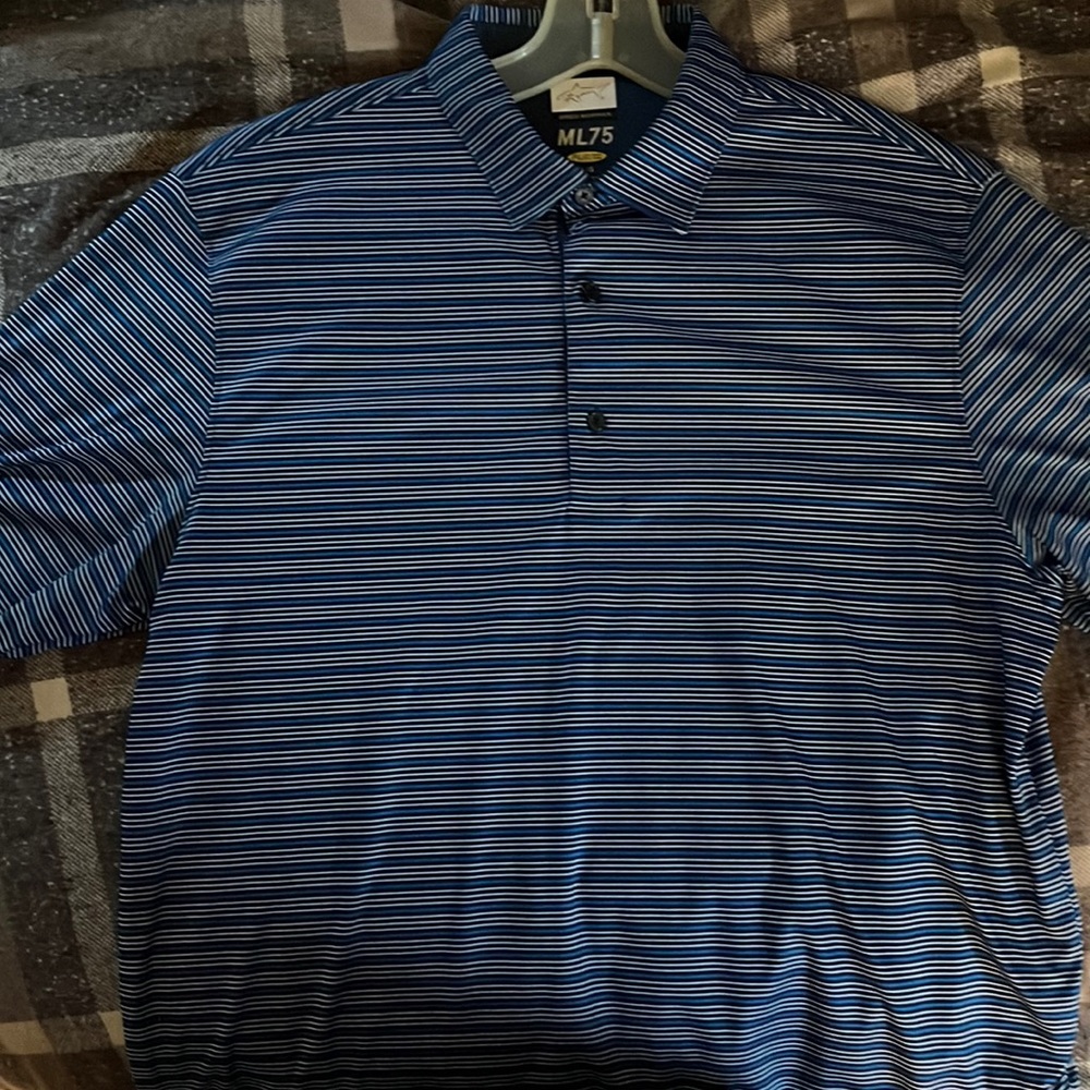 Greg Norman Polo. L. Like new.